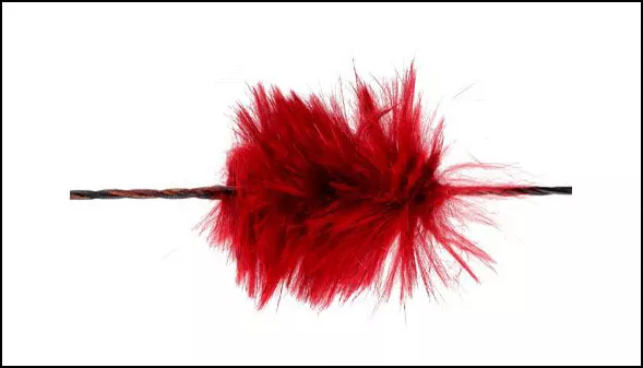 Tlumič na tětivu luku z kožešiny